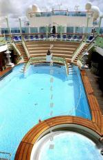 ID 3006 SAPPHIRE PRINCESS (2004/115875grt/IMO 9228186) - The swim-against-the-current lap pool on Sun Deck.
